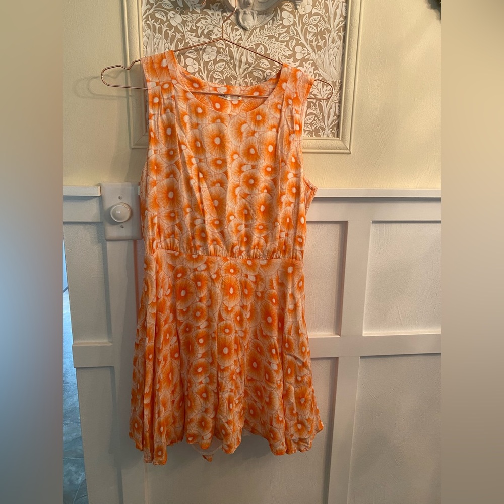 Orange Mod print open back A- line mini dress